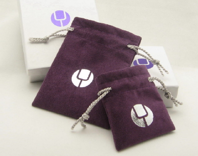 Amatista Ultrasuede Light jewelry pouches with white swirl box