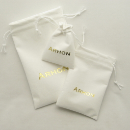 White Ultrasuede Light jewelry pouches